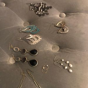 Lot of 7 pairs of used costume jewelry earrings.
